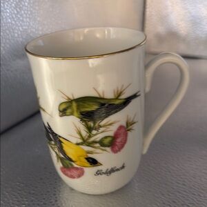 Elegant Bird Motif Mug - White with Green and Yellow Design